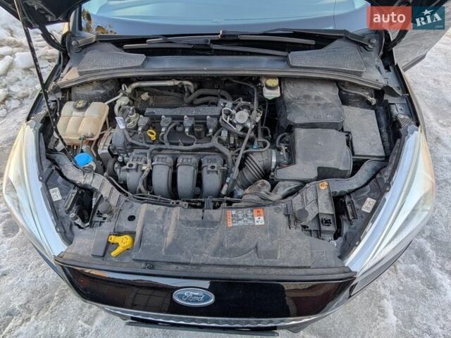Чорний Форд Фокус, об'ємом двигуна 2 л та пробігом 146 тис. км за 11000 $, фото 22 на Automoto.ua