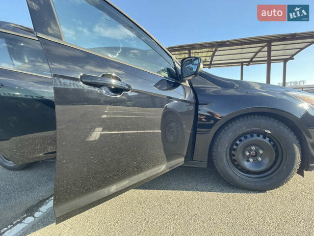 Черный Форд Фокус, объемом двигателя 2 л и пробегом 112 тыс. км за 10800 $, фото 14 на Automoto.ua