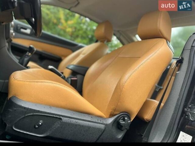 Черный Форд Фокус, объемом двигателя 2 л и пробегом 122 тыс. км за 6999 $, фото 1 на Automoto.ua