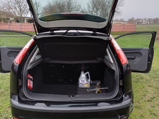 Черный Форд Фокус, объемом двигателя 1.4 л и пробегом 170 тыс. км за 3500 $, фото 4 на Automoto.ua