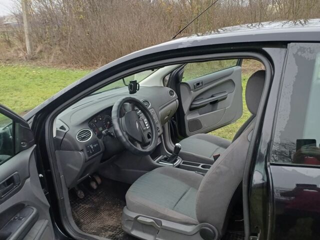 Черный Форд Фокус, объемом двигателя 1.4 л и пробегом 170 тыс. км за 3500 $, фото 3 на Automoto.ua