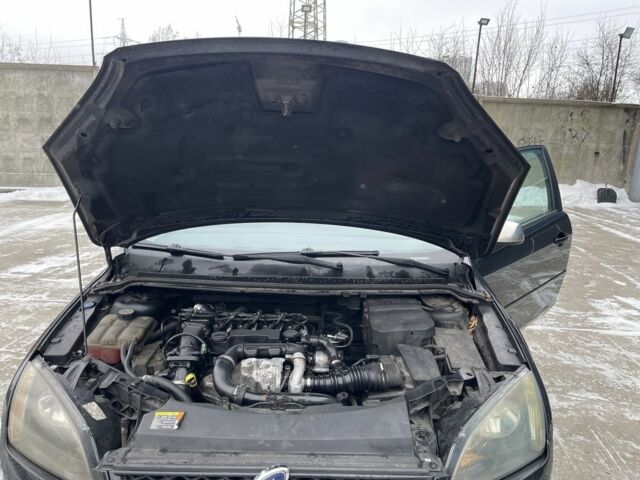 Черный Форд Фокус, объемом двигателя 1.6 л и пробегом 150 тыс. км за 2999 $, фото 7 на Automoto.ua