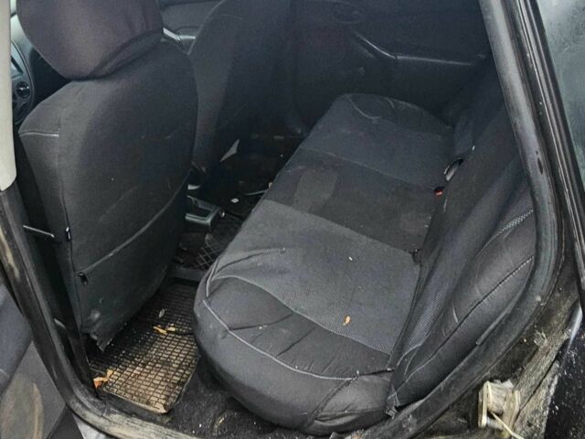 Черный Форд Фокус, объемом двигателя 1.6 л и пробегом 300 тыс. км за 1800 $, фото 10 на Automoto.ua