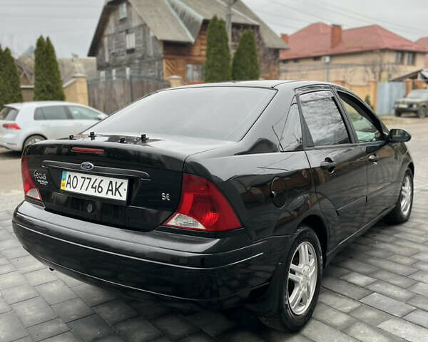 Черный Форд Фокус, объемом двигателя 1.8 л и пробегом 178 тыс. км за 2850 $, фото 9 на Automoto.ua