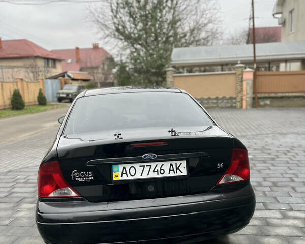 Черный Форд Фокус, объемом двигателя 1.8 л и пробегом 178 тыс. км за 2850 $, фото 8 на Automoto.ua