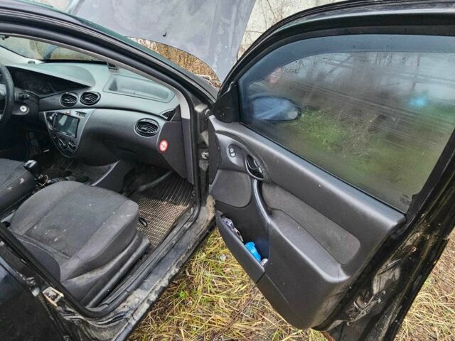 Черный Форд Фокус, объемом двигателя 1.6 л и пробегом 300 тыс. км за 1800 $, фото 9 на Automoto.ua