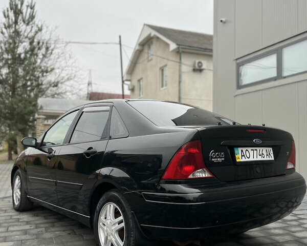 Черный Форд Фокус, объемом двигателя 1.8 л и пробегом 178 тыс. км за 2850 $, фото 7 на Automoto.ua