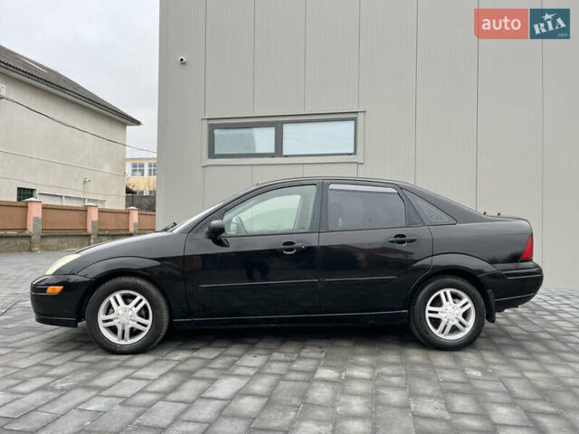 Черный Форд Фокус, объемом двигателя 1.8 л и пробегом 178 тыс. км за 2850 $, фото 5 на Automoto.ua