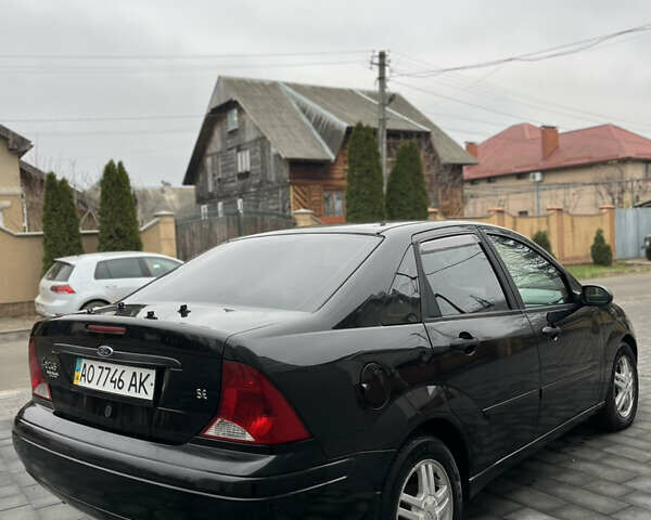 Черный Форд Фокус, объемом двигателя 1.8 л и пробегом 178 тыс. км за 2850 $, фото 10 на Automoto.ua