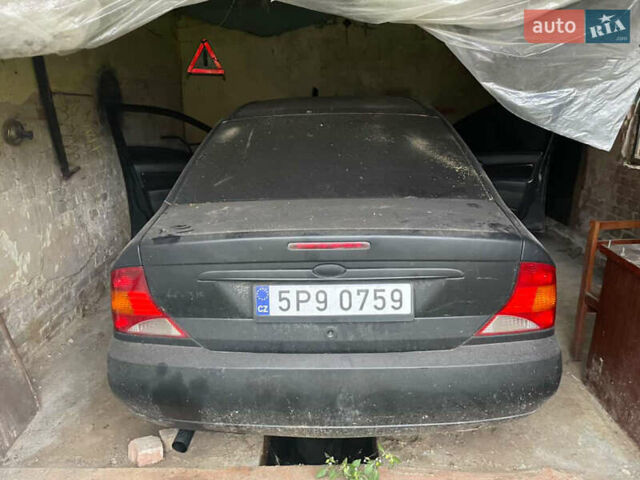 Черный Форд Фокус, объемом двигателя 1.8 л и пробегом 300 тыс. км за 600 $, фото 4 на Automoto.ua