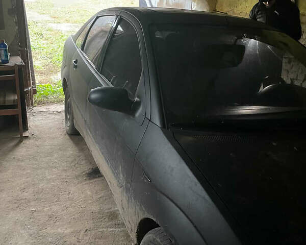 Черный Форд Фокус, объемом двигателя 1.8 л и пробегом 300 тыс. км за 600 $, фото 3 на Automoto.ua