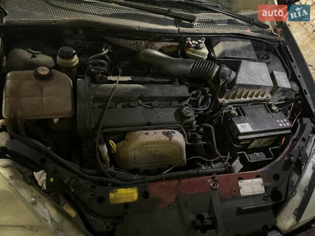 Черный Форд Фокус, объемом двигателя 1.8 л и пробегом 300 тыс. км за 600 $, фото 12 на Automoto.ua