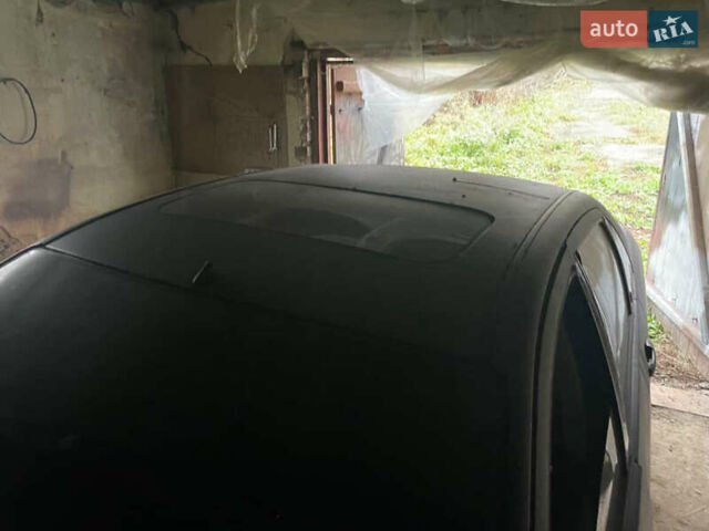 Черный Форд Фокус, объемом двигателя 1.8 л и пробегом 300 тыс. км за 600 $, фото 10 на Automoto.ua