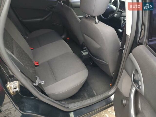 Чорний Форд Фокус, об'ємом двигуна 1.6 л та пробігом 100 тис. км за 4550 $, фото 2 на Automoto.ua