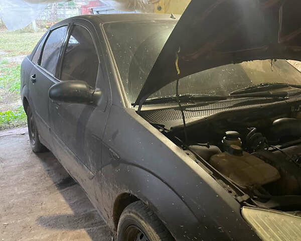 Черный Форд Фокус, объемом двигателя 1.8 л и пробегом 300 тыс. км за 600 $, фото 11 на Automoto.ua