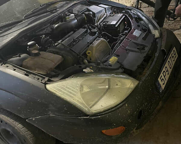 Черный Форд Фокус, объемом двигателя 1.8 л и пробегом 300 тыс. км за 600 $, фото 19 на Automoto.ua