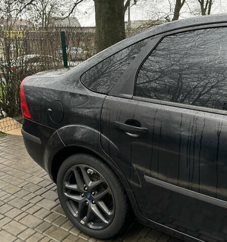 Черный Форд Фокус, объемом двигателя 1.39 л и пробегом 201 тыс. км за 4899 $, фото 7 на Automoto.ua