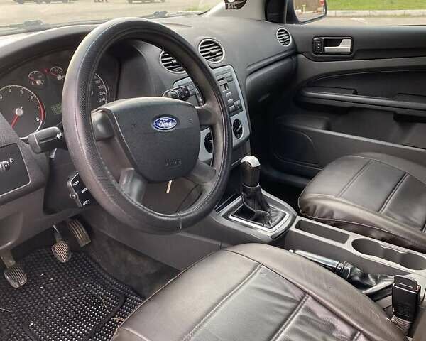 Черный Форд Фокус, объемом двигателя 1.6 л и пробегом 318 тыс. км за 4000 $, фото 4 на Automoto.ua