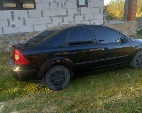 Черный Форд Фокус, объемом двигателя 1.39 л и пробегом 270 тыс. км за 3450 $, фото 4 на Automoto.ua