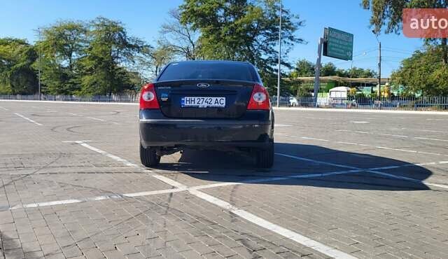 Черный Форд Фокус, объемом двигателя 1.8 л и пробегом 186 тыс. км за 4900 $, фото 13 на Automoto.ua