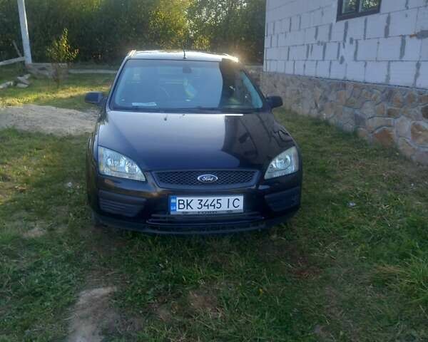 Черный Форд Фокус, объемом двигателя 1.39 л и пробегом 270 тыс. км за 3450 $, фото 3 на Automoto.ua
