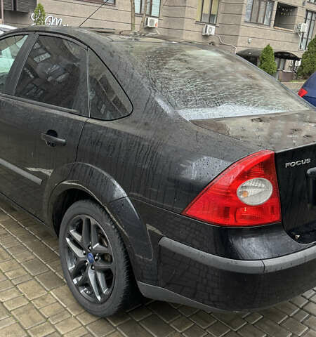 Черный Форд Фокус, объемом двигателя 1.39 л и пробегом 201 тыс. км за 4899 $, фото 5 на Automoto.ua