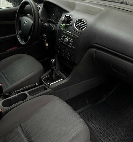 Черный Форд Фокус, объемом двигателя 1.39 л и пробегом 201 тыс. км за 4899 $, фото 16 на Automoto.ua