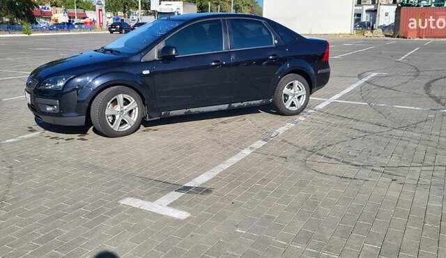 Черный Форд Фокус, объемом двигателя 1.8 л и пробегом 186 тыс. км за 4900 $, фото 8 на Automoto.ua