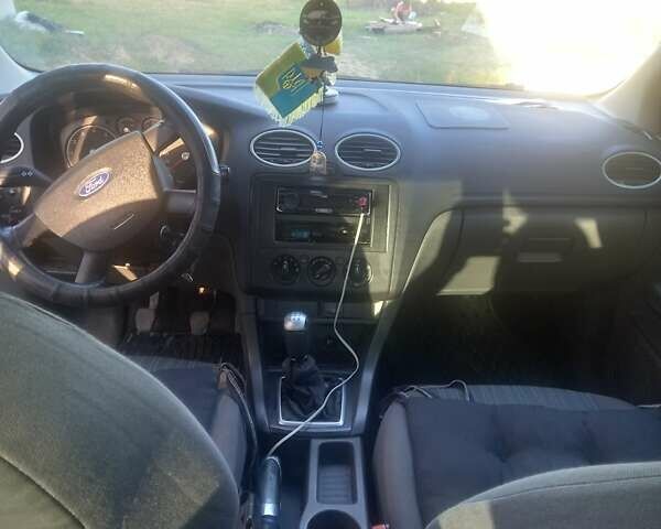 Черный Форд Фокус, объемом двигателя 1.39 л и пробегом 270 тыс. км за 3450 $, фото 8 на Automoto.ua