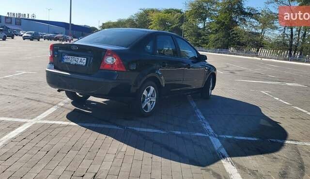 Черный Форд Фокус, объемом двигателя 1.8 л и пробегом 186 тыс. км за 4900 $, фото 9 на Automoto.ua