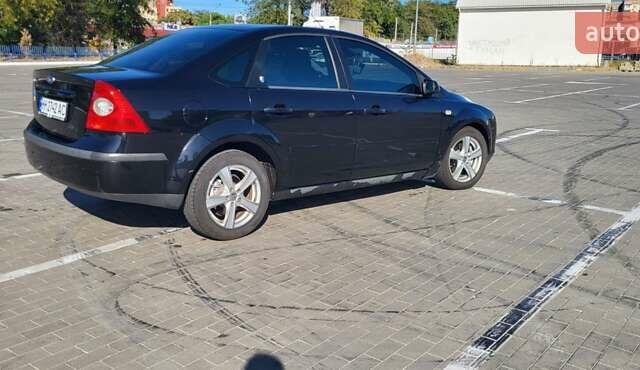 Черный Форд Фокус, объемом двигателя 1.8 л и пробегом 186 тыс. км за 4900 $, фото 7 на Automoto.ua