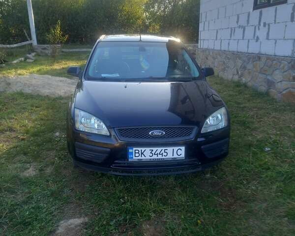 Черный Форд Фокус, объемом двигателя 1.39 л и пробегом 270 тыс. км за 3450 $, фото 2 на Automoto.ua