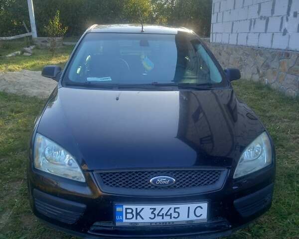 Черный Форд Фокус, объемом двигателя 1.39 л и пробегом 270 тыс. км за 3450 $, фото 1 на Automoto.ua
