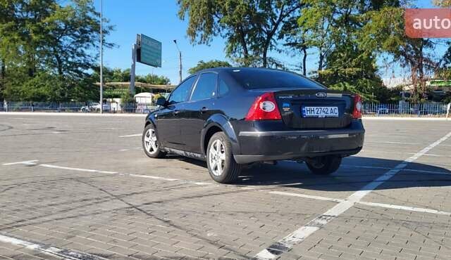Черный Форд Фокус, объемом двигателя 1.8 л и пробегом 186 тыс. км за 4900 $, фото 4 на Automoto.ua