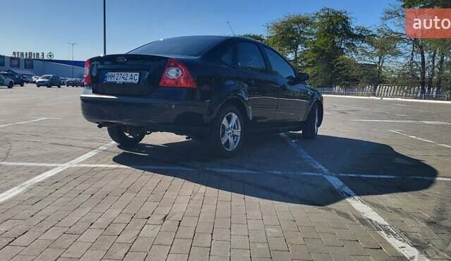 Черный Форд Фокус, объемом двигателя 1.8 л и пробегом 186 тыс. км за 4900 $, фото 15 на Automoto.ua