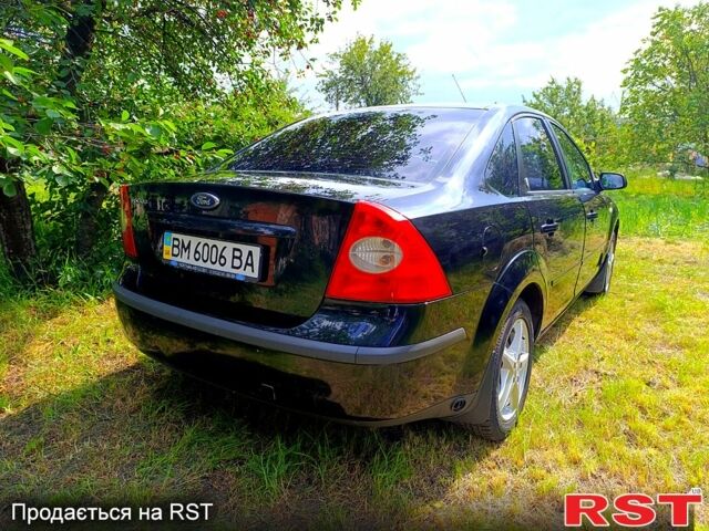 Черный Форд Фокус, объемом двигателя 1.6 л и пробегом 235 тыс. км за 4500 $, фото 1 на Automoto.ua