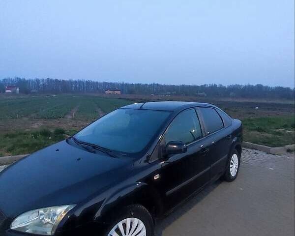 Черный Форд Фокус, объемом двигателя 1.56 л и пробегом 270 тыс. км за 4500 $, фото 2 на Automoto.ua