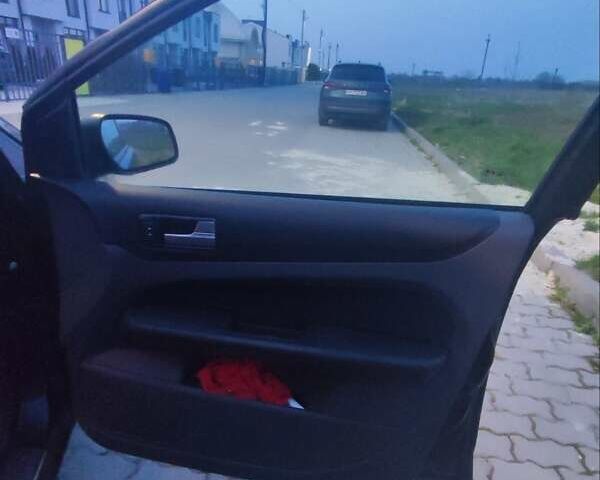 Черный Форд Фокус, объемом двигателя 1.56 л и пробегом 270 тыс. км за 4500 $, фото 12 на Automoto.ua