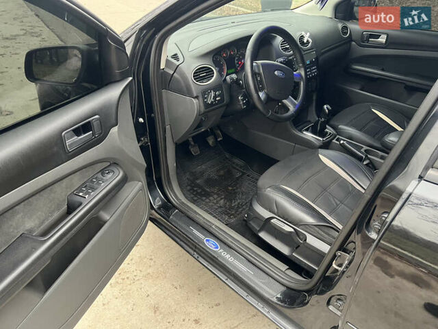 Черный Форд Фокус, объемом двигателя 2 л и пробегом 220 тыс. км за 5500 $, фото 15 на Automoto.ua