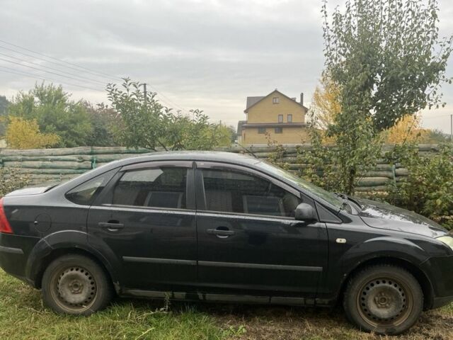 Черный Форд Фокус, объемом двигателя 1.6 л и пробегом 250 тыс. км за 3100 $, фото 1 на Automoto.ua