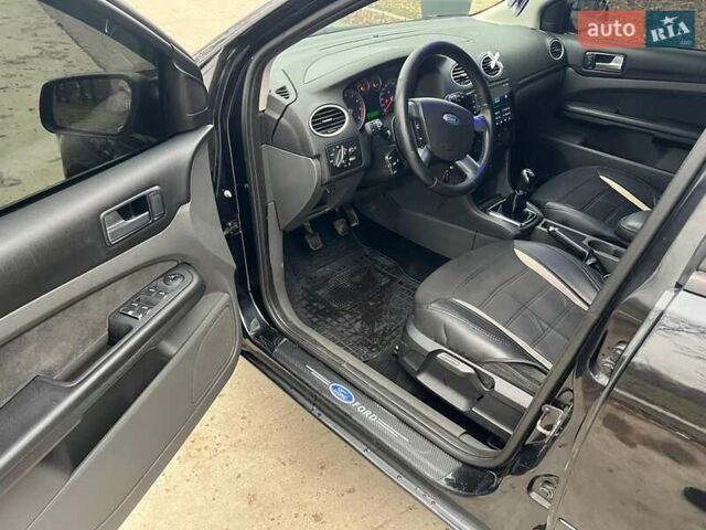 Черный Форд Фокус, объемом двигателя 2 л и пробегом 220 тыс. км за 5650 $, фото 12 на Automoto.ua