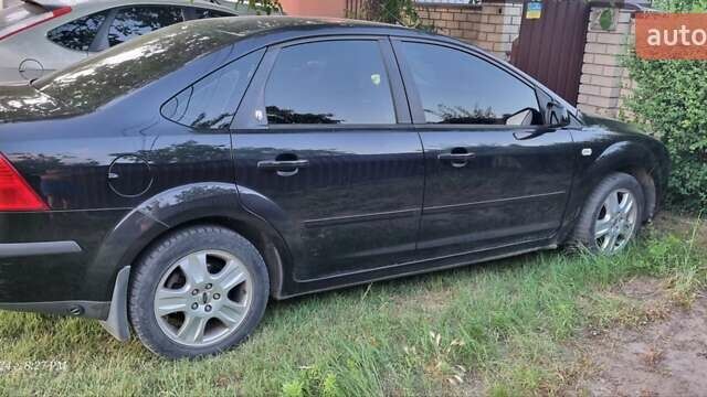 Черный Форд Фокус, объемом двигателя 2 л и пробегом 260 тыс. км за 4900 $, фото 2 на Automoto.ua