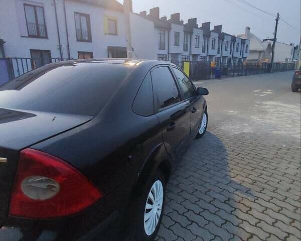 Черный Форд Фокус, объемом двигателя 1.56 л и пробегом 270 тыс. км за 4500 $, фото 6 на Automoto.ua