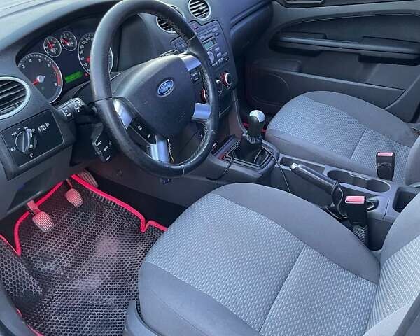 Черный Форд Фокус, объемом двигателя 1.6 л и пробегом 85 тыс. км за 3800 $, фото 10 на Automoto.ua