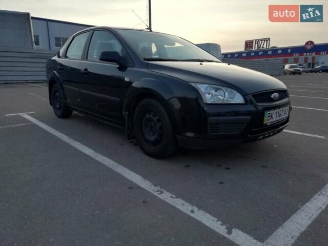 Черный Форд Фокус, объемом двигателя 1.4 л и пробегом 31 тыс. км за 6000 $, фото 6 на Automoto.ua