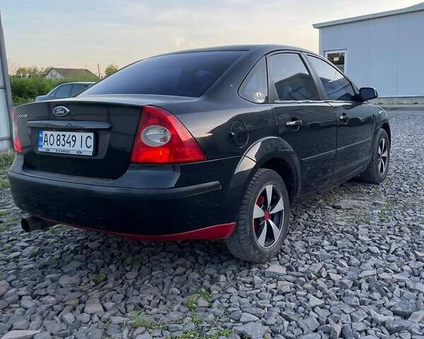 Черный Форд Фокус, объемом двигателя 1.6 л и пробегом 85 тыс. км за 3800 $, фото 5 на Automoto.ua