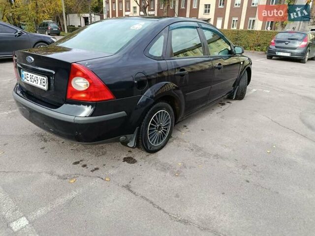 Форд Фокус 2007 в Каменское - Днепродзержинск на Automoto.ua Черный Форд Фокус, объемом двигателя 1.6 л и пробегом 227 тыс. км за 4000 $, фото 5 на Automoto.ua