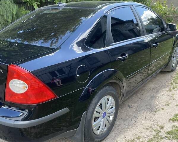 Чорний Форд Фокус, об'ємом двигуна 2 л та пробігом 226 тис. км за 5800 $, фото 2 на Automoto.ua
