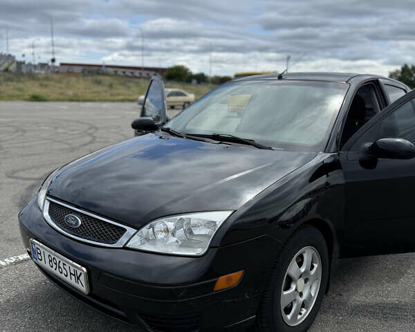 Черный Форд Фокус, объемом двигателя 2 л и пробегом 260 тыс. км за 4400 $, фото 16 на Automoto.ua