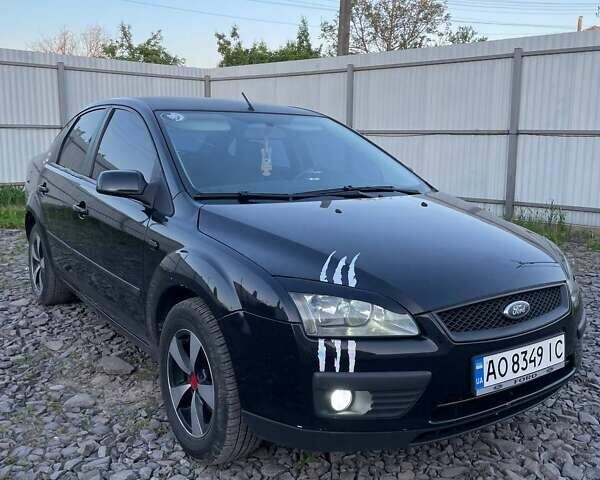 Черный Форд Фокус, объемом двигателя 1.6 л и пробегом 85 тыс. км за 3800 $, фото 4 на Automoto.ua